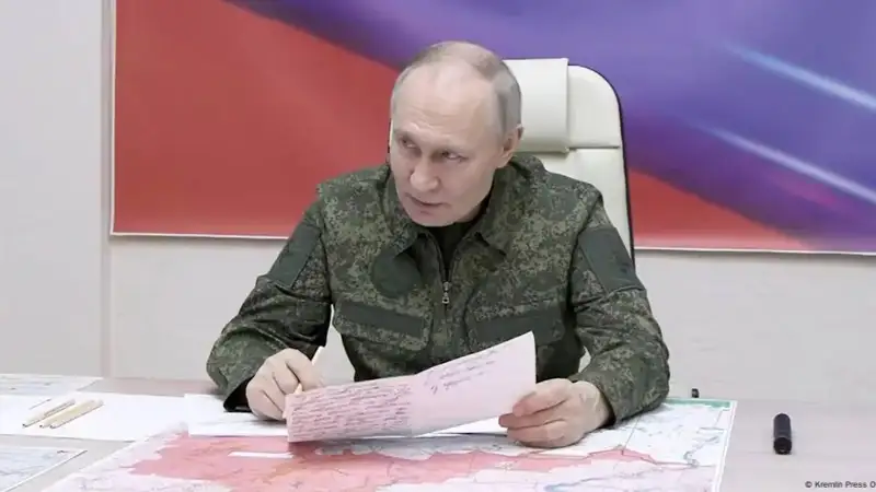 Путин