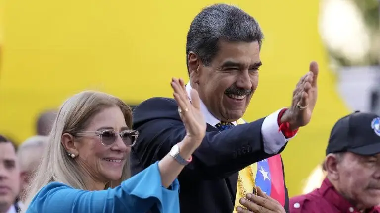 Мадуро жұбайымен 